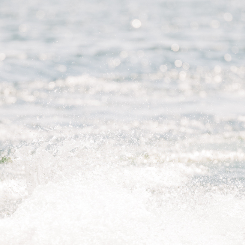 Dad and son wakeboarding together