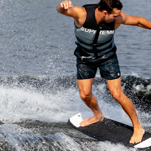 Man riding a wakeskate board