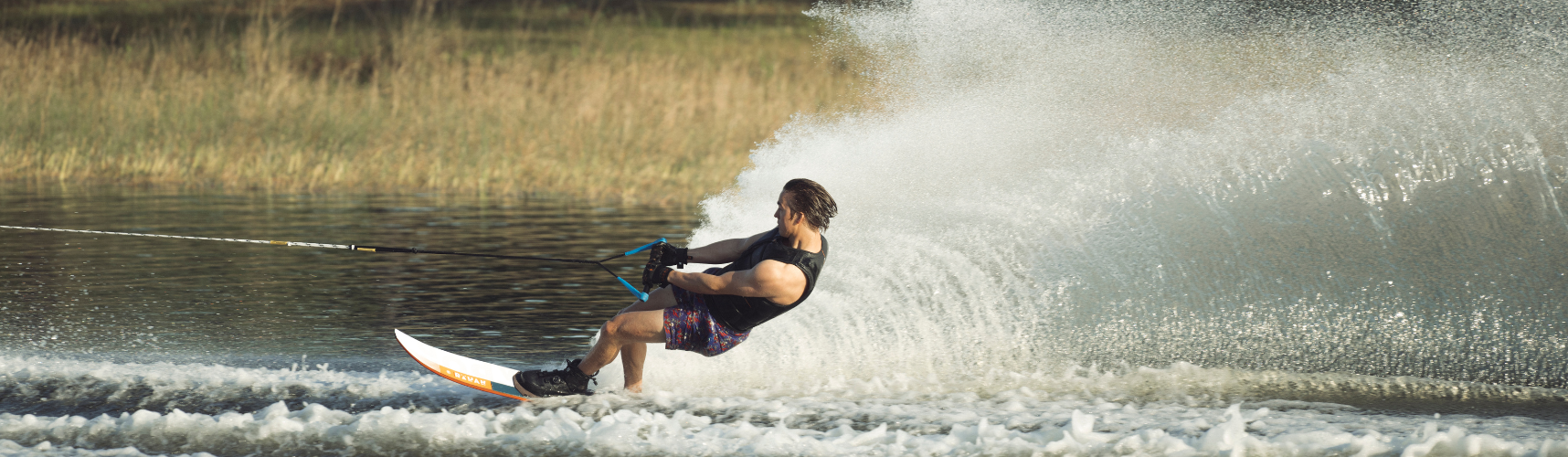 Man water skiing behind a boat