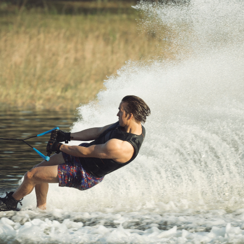 Man water skiing behind a boat